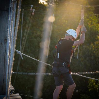 A stag adventurer navigating a challenging high ropes in Dusseldorf