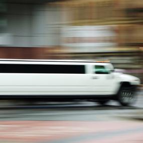 Stag party Hummer limo cruising through Dusseldorf's streets